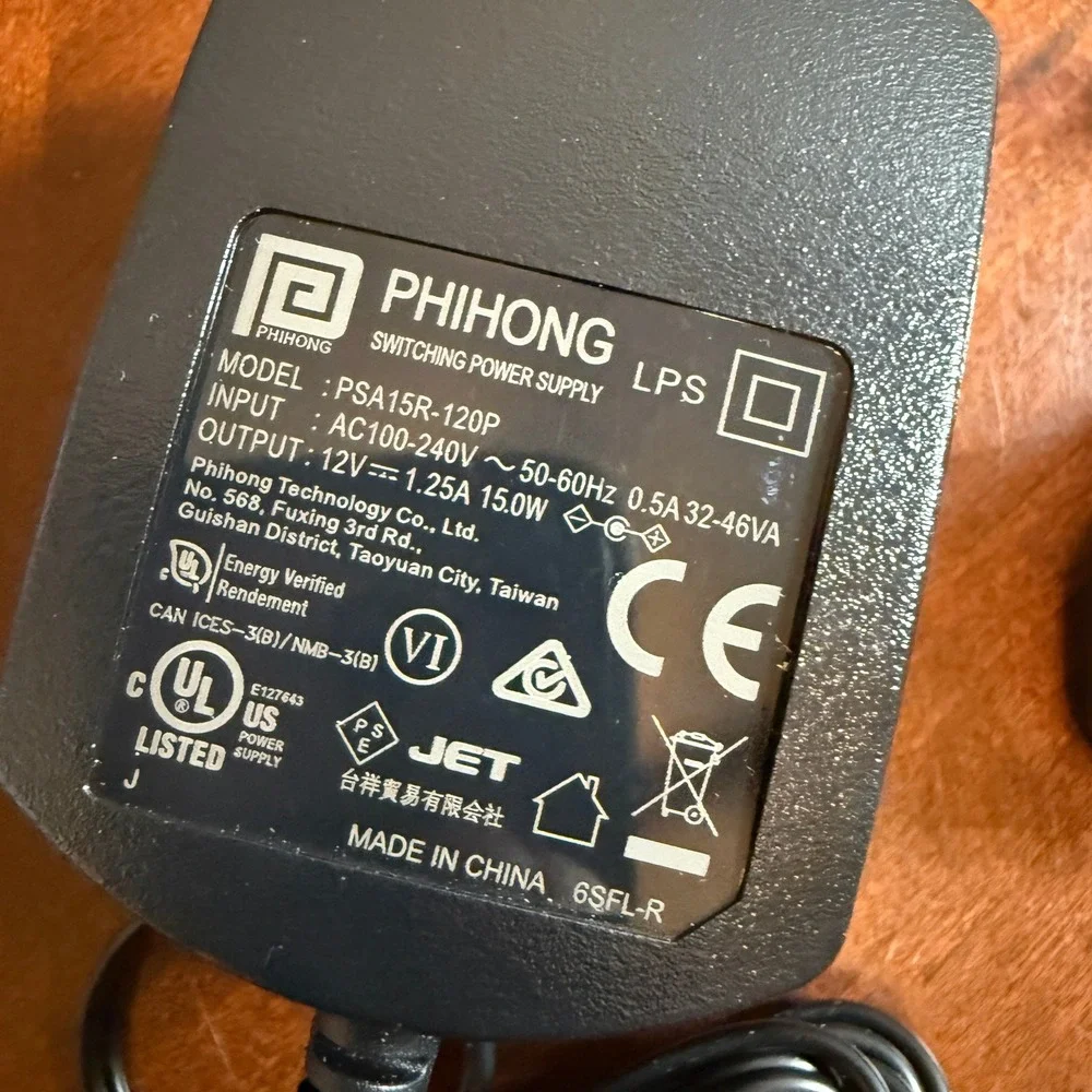 Phihong PSA15R-120P 12V 1.25A 15W Power Supply with 4 International Adapters